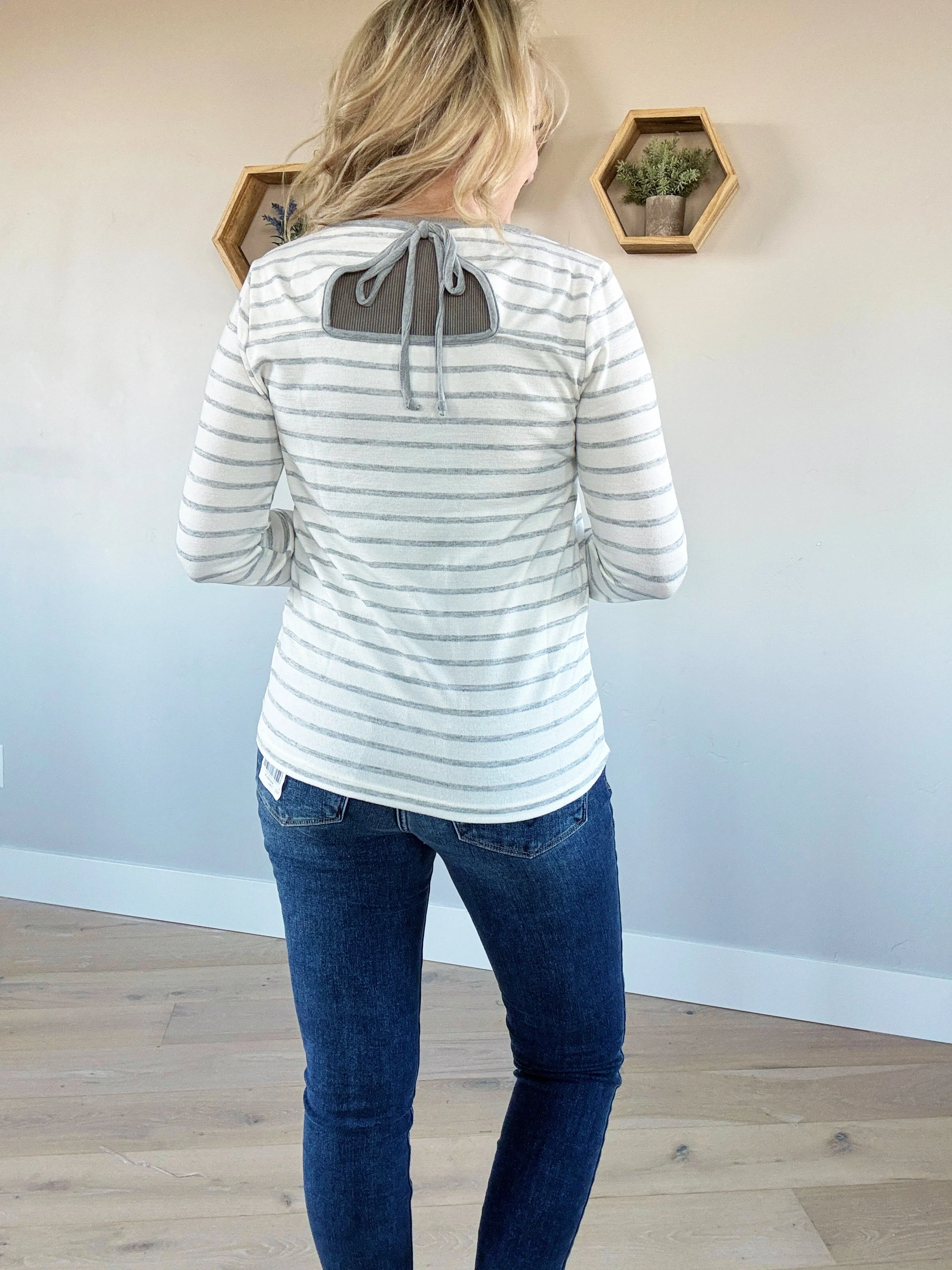 Opportunities Knocking Cut Out Tie-Back Long Sleeve in Ivory & Heather Gray